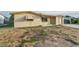 Charming single-story home featuring a light-colored exterior, attached garage, and front yard at 4920 Zodiac Ave, Holiday, FL 34690