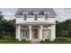 Charming two-story home features a covered porch with columns and classic design at 510 35Th N Ave, St Petersburg, FL 33704