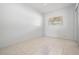 Bright bedroom with tile flooring, ceiling fan, and natural light at 5111 Eldorado Dr, Tampa, FL 33615