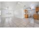 Bright, open-plan living area with tile flooring and ample natural light at 5111 Eldorado Dr, Tampa, FL 33615