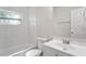 Bathroom featuring tub, toilet, and vanity at 5119 Gateway Dr, Tampa, FL 33615