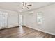 A bedroom with a walk-in shower and a door leading to the hallway at 5119 Gateway Dr, Tampa, FL 33615