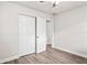 Bedroom boasts wood-look floors and a closet at 5119 Gateway Dr, Tampa, FL 33615