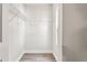 A walk-in closet with shelves and a window at 5119 Gateway Dr, Tampa, FL 33615