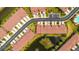 Aerial view of property's location within the neighborhood, and proximity to a pond at 582 53Rd N Ave, St Petersburg, FL 33703