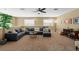 Comfortable upstairs living area with ample seating, neutral walls, and bright natural light from the window at 582 53Rd N Ave, St Petersburg, FL 33703