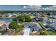 Beautiful home in an established neighborhood near a pond, featuring mature trees and lush lawns at 603 Fort Duquesna Dr, Sun City Center, FL 33573