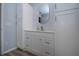 Bright bathroom featuring white vanity, modern fixtures, and updated flooring at 603 Fort Duquesna Dr, Sun City Center, FL 33573