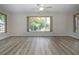 Bright and spacious living area with large windows and modern flooring offering ample natural light at 603 Fort Duquesna Dr, Sun City Center, FL 33573