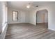 Living room features laminate flooring, neutral walls, and exterior views at 603 Fort Duquesna Dr, Sun City Center, FL 33573