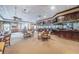 Spacious bar and grill with seating and full bar area at 617 Glastonbury Ct, Spring Hill, FL 34609