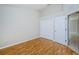 Empty room with a closet and laminate flooring at 617 Glastonbury Ct, Spring Hill, FL 34609