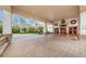 Inviting covered entrance with brick flooring and decorative wreaths at 617 Glastonbury Ct, Spring Hill, FL 34609