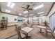 Inviting game room featuring tables and chairs for cards and board games at 617 Glastonbury Ct, Spring Hill, FL 34609