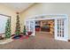 Hallway that leads to the Bar & Grill, decorated with festive decorations at 617 Glastonbury Ct, Spring Hill, FL 34609