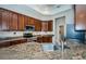 Close up of a kitchen showcasing granite countertops and a stainless steel faucet at 617 Glastonbury Ct, Spring Hill, FL 34609