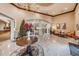 Elegant lobby with chandelier, tile floors, and festive holiday decorations at 617 Glastonbury Ct, Spring Hill, FL 34609