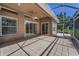 Spacious tiled and screened patio for outdoor enjoyment and entertaining at 617 Glastonbury Ct, Spring Hill, FL 34609