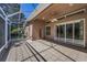 Spacious tiled and screened patio for outdoor enjoyment and entertaining at 617 Glastonbury Ct, Spring Hill, FL 34609