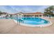 A lovely community pool with plenty of space to lounge in the sun at 617 Glastonbury Ct, Spring Hill, FL 34609