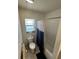 Clean bathroom with a shower-tub combination and a small window at 641 N Garden Ave, Clearwater, FL 33755