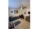 Cozy bedroom featuring a ceiling fan, tile flooring, and neutral décor at 641 N Garden Ave, Clearwater, FL 33755