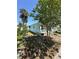 Quaint single-story home with charming porch and lush landscaping at 641 N Garden Ave, Clearwater, FL 33755
