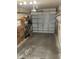 Spacious garage ready for parking or storage, concrete floor at 641 N Garden Ave, Clearwater, FL 33755