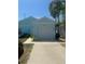 Attached one-car garage providing convenient parking and additional storage space at 641 N Garden Ave, Clearwater, FL 33755