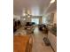 Open-concept living area with tile floors, plenty of seating and lots of natural light at 641 N Garden Ave, Clearwater, FL 33755