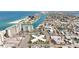 Stunning aerial view showcasing the beautiful coastal community with waterfront access and nearby amenities at 7050 Sunset Way # 22, St Pete Beach, FL 33706