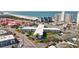 Expansive aerial view of condo building with pristine sandy beach and ocean views at 7050 Sunset Way # 22, St Pete Beach, FL 33706