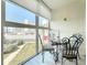 Bright balcony with outdoor seating, perfect for enjoying the views and natural light at 7050 Sunset Way # 22, St Pete Beach, FL 33706