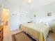 Bright bedroom with a comfortable bed, closet and ensuite bathroom at 7050 Sunset Way # 22, St Pete Beach, FL 33706