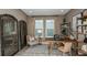 Stylish office space featuring neutral paint, a wooden desk, and decorative accents, ideal for working from home at 731 Sky Shade Dr, Apollo Beach, FL 33572