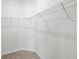 Empty walk-in closet with wire shelving at 7405 Stonebrook Cir, Wesley Chapel, FL 33545