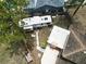 Aerial view of backyard with RV parked and landscaping and adjacent home at 771 Murphy N Ave, St Petersburg, FL 33703