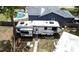Backyard featuring a recreational vehicle (RV) parked near a home with an inviting in-ground pool at 771 Murphy N Ave, St Petersburg, FL 33703
