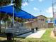 Baseball field with bleacher seating, offering a comfortable spot for spectators to enjoy the games at 771 Murphy N Ave, St Petersburg, FL 33703