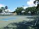 Well-maintained basketball court with professional markings, ideal for sports and recreation in the community at 771 Murphy N Ave, St Petersburg, FL 33703
