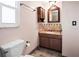 Charming bathroom featuring granite countertops, elegant mirror, and beautiful mosaic tile backsplash at 771 Murphy N Ave, St Petersburg, FL 33703