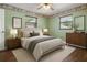 Charming bedroom with decorative border, natural light, and wood floors at 771 Murphy N Ave, St Petersburg, FL 33703
