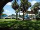 Lush landscaping surrounds the inviting community pool area, providing a relaxing recreational space at 771 Murphy N Ave, St Petersburg, FL 33703