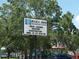 Exterior view of Willis S. Johns Recreation Center sign, promoting swim lessons and summer registration at 771 Murphy N Ave, St Petersburg, FL 33703