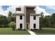Modern three-story home featuring a bright yellow front door, clean lines and neutral colors, surrounded by lush landscaping at 801 N Oregon Ave, Tampa, FL 33606