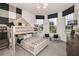 Unique bedroom featuring a bunk bed with fun design elements, two large windows, and comfortable beanbag chairs at 9950 Trellis Vine Way, Parrish, FL 34219