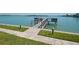 Long boat dock extends into the bay, ideal for the avid boaters and water enthusiasts at 1 Key Capri # 608E, Treasure Island, FL 33706