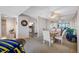 A very nice, clean, and spacious living room with a dining area at 1 Key Capri # 608E, Treasure Island, FL 33706