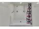 Community shower facility with modern fixtures and accessibility features, ensuring a comfortable experience for residents at 1 Key Capri # 608E, Treasure Island, FL 33706