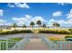 Lovely waterway view from the property stairs, complete with Palm Trees, grass and a gorgeous waterway! at 1 Key Capri # 608E, Treasure Island, FL 33706